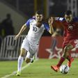 USA's Christian Pulisic (L) fights for the ball with Panama's Anibal Godoy during their FIFA 2018 World Cup qualifier in Panama City, on March 28, 2017