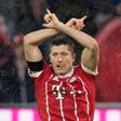 Bayern Munich's Polish forward Robert Lewandowski celebrates scoring a goal during the German First division Bundesliga football match against Leverkusen August 18, 2017