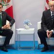 Mexican President Enrique Pena Nieto (L) says he has not recently spoken to Donald Trump on the phone, countering US leader's claim