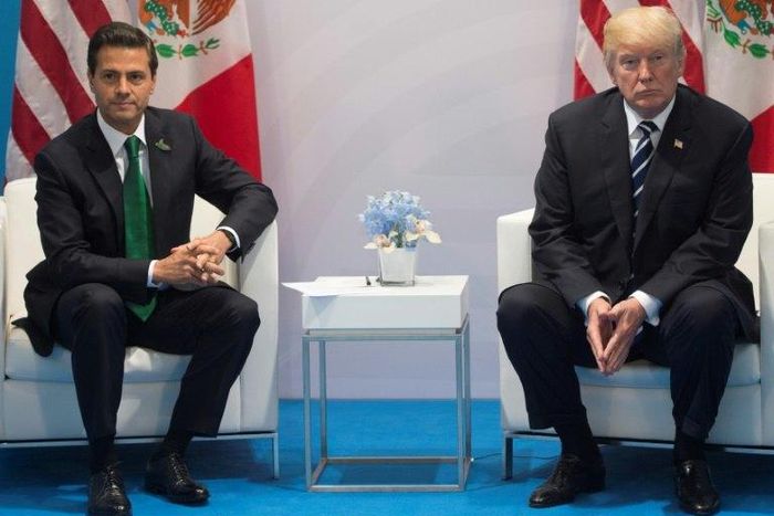 Mexican President Enrique Pena Nieto (L) says he has not recently spoken to Donald Trump on the phone, countering US leader's claim