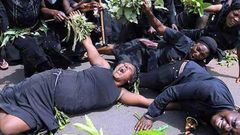 Mourners at a funeral