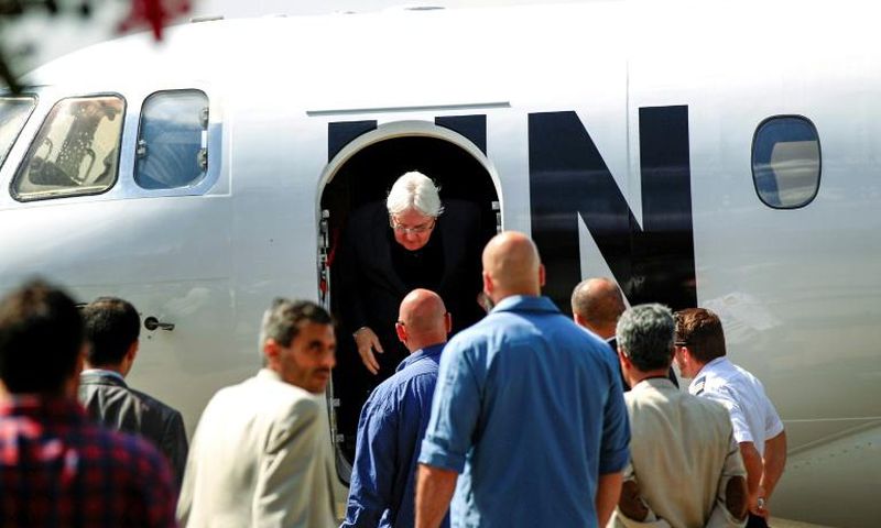 Martin Griffiths (C), the UN special envoy for Yemen, arrives at Sanaa international airport on November 21, 2018
