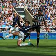 Tottenham midfielder Dele Alli scores his team's first and the opening goal during the English Premier League match against Newcastle in Newcastle-upon-Tyne, north east England on August 13, 2017