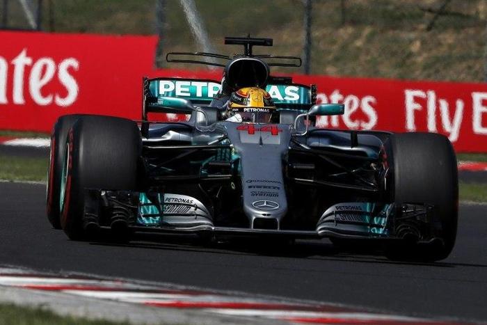 Lewis Hamilton slowed at the final corner of the Hungarian Grand Prix to give a podium finish to Mercedes team-mate Valtteri Bottas