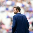 England's coach Gareth Southgate walks on the pitch ahead of the international friendly football match between France and England at the Stade de France stadium June 13, 2017