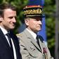 French President Emmanuel Macron (left) and outgoing armed forces chief General Pierre de Villiers, pictured during the annual Bastille Day military parade in Paris on July 14, 2017
