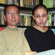 File photo released by the Liu's family and taken on October 22, 2002 shows Chinese dissident and Nobel Peace laureate Liu Xiaobo and his wife Liu Xia in Beijing