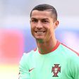Portugal's Cristiano Ronaldo smiles during a training session on the eve of the Confederations Cup match against Mexico in the Russian city of Kazan