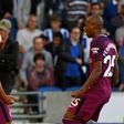 Manchester City's striker Sergio Aguero (2nd L) celebrates with midfielders Kevin De Bruyne (L) and Fernandinho (R) at the American Express Community Stadium in Brighton, southern England on August 12, 2017