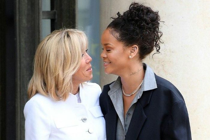Barbadian R&B icon Rihanna (R) with French First Lady Brigitte Macron in Paris. She described her meeting President Emanuel Macron as 'incredible'.