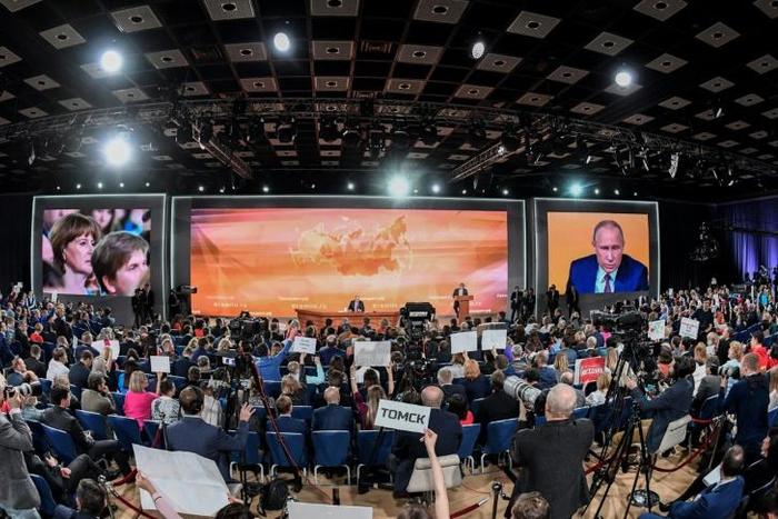 Russian President Vladimir Putin faces journalists at last year's annual press conference