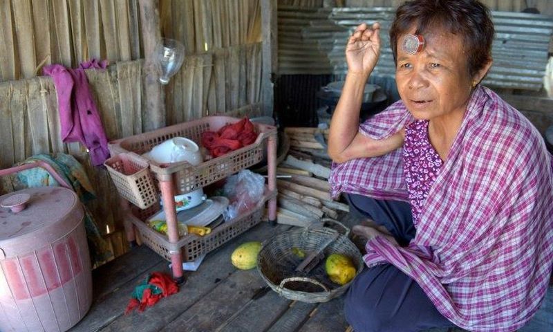 Chhum Long's daughter was paid $10,000 to be a surrogate mother, a sum worth nearly a decade of average income in Cambodia