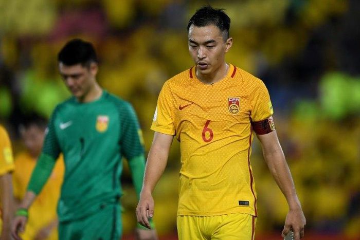 Feng Xiaoting (R) of China reacts after a 2-2 draw against Syria in their FIFA World Cup 2018 Group A third round qualifying match at the Hang Jebat Stadium in Kampung Kerubong in Malacca on June 13, 2017