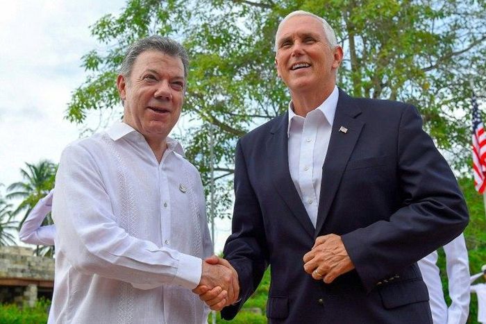 US Vice President Mike Pence, seen in this handout meeting with Colombia's President Juan Manuel Santos in Cartagena, is on a Latin American tour dominated by concerns over Venezuela