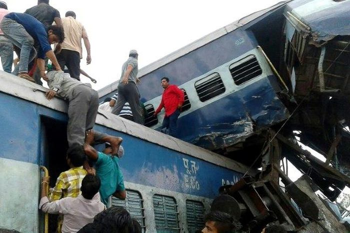 Local residents search for survivors of the train crash