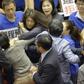 The Taiwan lawmakers' brawl was broken up by about dozen people