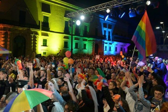 A file photo shows people celebrating the approval of a civil unions bill in the Maltese capital on April 14, 2014