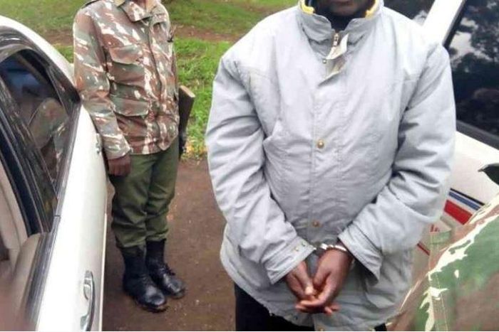 File image of a suspected arrested by police. KCSE candidate is being held in Mandera for allegedly writing a message on killing President Uhuru Kenyatta and Aden Duale