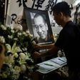 Democracy activists and members of the public gathered outside China's liaison office in Hong Kong Thursday night to mourn the death in custody of China's Nobel laureate Liu Xiaobo and vent their anger at Beijing.
