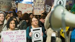 Israelis protest sexual violence against women on December 4, 2016 in Tel Aviv