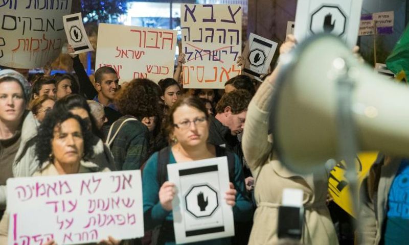 Israelis protest sexual violence against women on December 4, 2016 in Tel Aviv