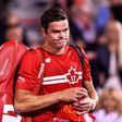 Milos Raonic of Canada walks off the court after his defeat against Adrian Mannarino of France during day six of the Rogers Cup presented by National Bank at Uniprix Stadium on August 9, 2017 in Montreal, Quebec