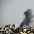Smoke billows following an airstrike on the western frontline of Raqa on July 17, 2017