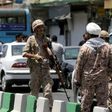 Members of the Iranian Revolutionary Guard secure the area outside parliament during an attack on the complex in Tehran on June 7, 2017