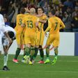 Australia celebrate their first goal during the World Cup qualifier against Saudi Arabia in Adelaide on June 8, 2017