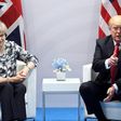 British Prime Minister Theresa May has come under fire for seeking to curry favour with Donald Trump by inviting him for a state visit just seven days after he took office.