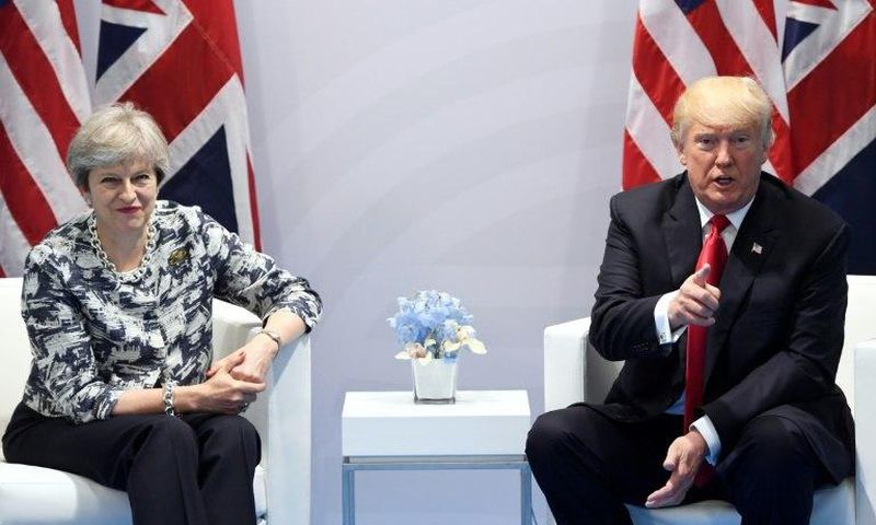 British Prime Minister Theresa May has come under fire for seeking to curry favour with Donald Trump by inviting him for a state visit just seven days after he took office.