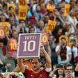Roma's forward from Italy Francesco Totti holds a framed Number 10 during a ceremony to celebrate his last match on May 28, 2017