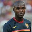 Eric Abidal (right) spent six years as a Barcelona player
