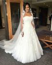 These photos will convince you to have a long bridal veil on your wedding day