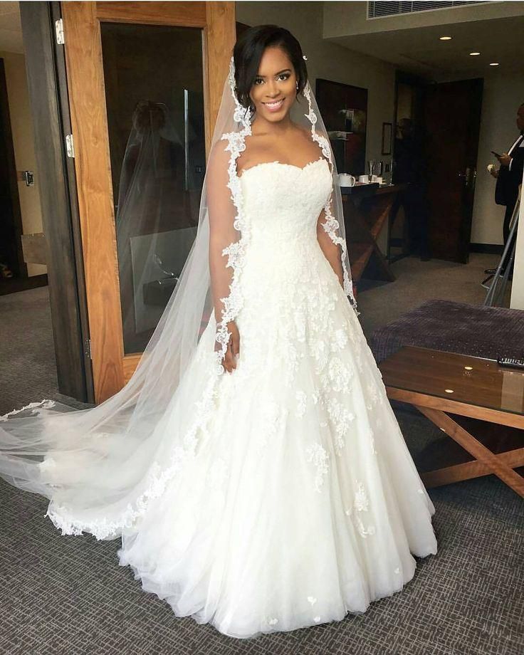These photos will convince you to have a long bridal veil on your wedding day