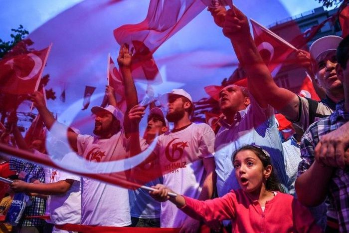 People mark the first anniversary of a failed coup attempt on July 16, 2017 at Taksim Square in Istanbul