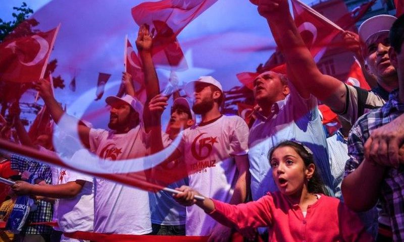 People mark the first anniversary of a failed coup attempt on July 16, 2017 at Taksim Square in Istanbul