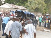Police transporting a dead body from a crime scene during a past incident