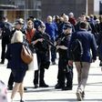 Armed woman police officers patrol with their male colleagues on London Bridge in London