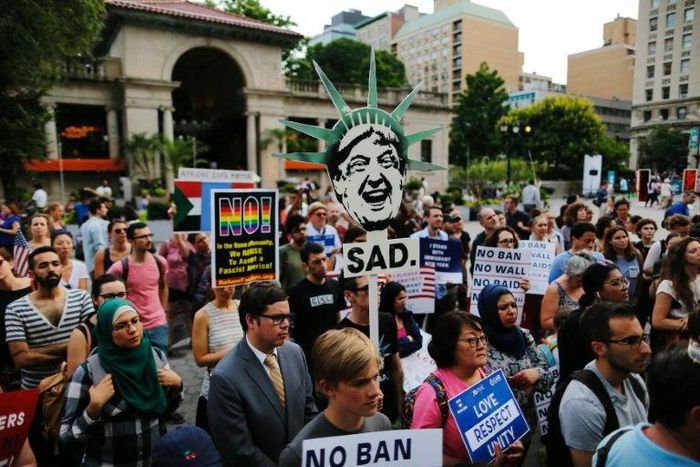 Protestors rally in New York against President Donald Trump's ban on travelers from six mostly Muslim countries ahead of its implementation late Thursday