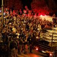 Palestinians celebrate outside the Al-Aqsa mosque compound on July 27, 2017, after more new Israeli security barriers were removed from the entrance