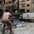 This photo taken on August 29, 2016 shows a Syrian Arab Red Crescent truck in a previous aid delivery to the rebel-held town of Harasta on the outskirts of Damascus