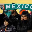 Mexico soccer fans cheer during the second half of a 2018 FIFA World Cup qualifying match between the Mexico men's national team and the US men's national team in Columbus, Ohio on November 11, 2016