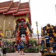 Instead of the traditional tranquil Buddhas and mythical beasts that adorn most monasteries in the land, the shimmering Wat Ta Kien temple outside Bangkok is guarded by three towering Transformer robots