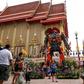 Instead of the traditional tranquil Buddhas and mythical beasts that adorn most monasteries in the land, the shimmering Wat Ta Kien temple outside Bangkok is guarded by three towering Transformer robots