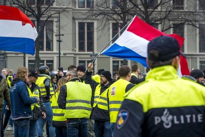 Protestors wearing yellow vests demonstrate in The Hague