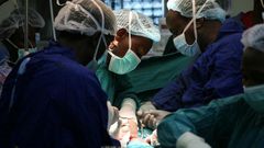 Kenyan surgeons performing a procedure