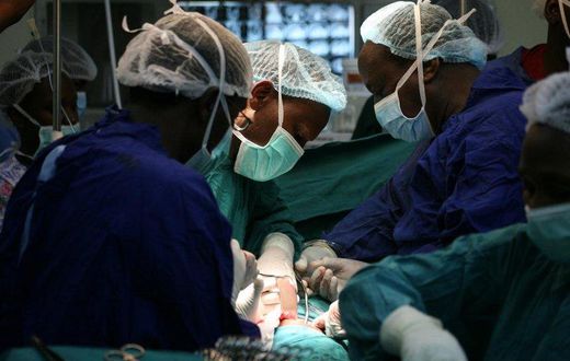 Kenyan surgeons performing a procedure