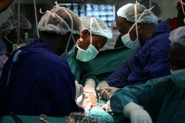 Kenyan surgeons performing a procedure