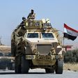 Iraqi government forces drive down a road leading to Tal Afar on June 9, 2017, before the official start of the assault to retake the town from the Islamic State group